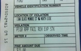 Getting a parking ticket for an expired sticker… and an up to date sticker.