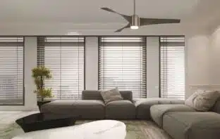 Energy-Saving Tips to Beat the Summer Heat and Lower Your Bills Energy-Saving Tips, a living room with blinds and a fan